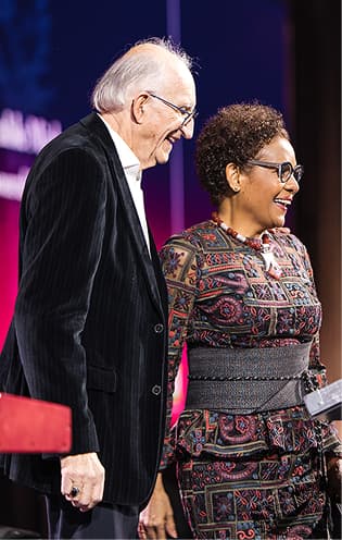 The Right Honorable Michaëlle Jean and Jean-Daniel Lafond on stage at the 2025 NBCS